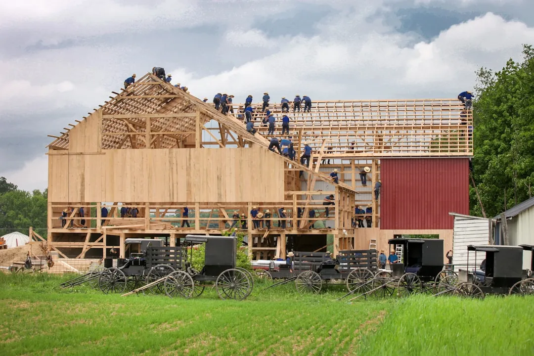 corporate team building a house with Habitat for Humanity - volunteer opportunities for businesses