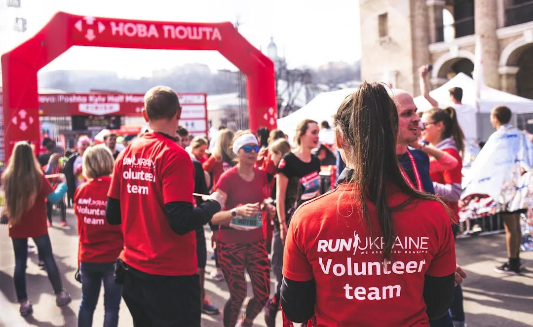 Employees participating in a company-sponsored charity run - csr initiatives for employees